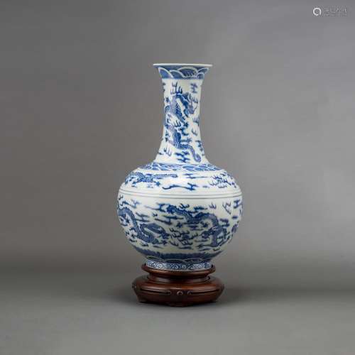 A CHINESE BLUE AND WHITE 'DRAGON' VASE