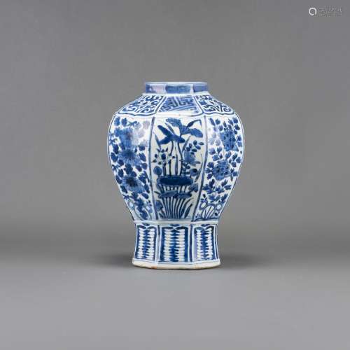 A BLUE AND WHITE 'FLOWER AND BIRD' OCTAGONAL VASE