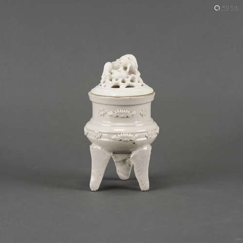 A WHITE GLAZED TRIPOD CENSER