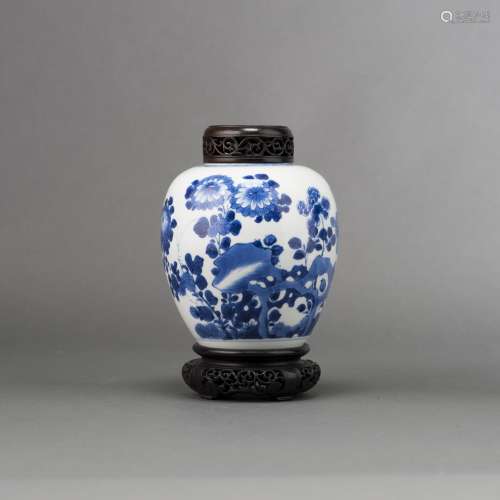 A BLUE AND WHITE JAR WITH COVER AND BASE