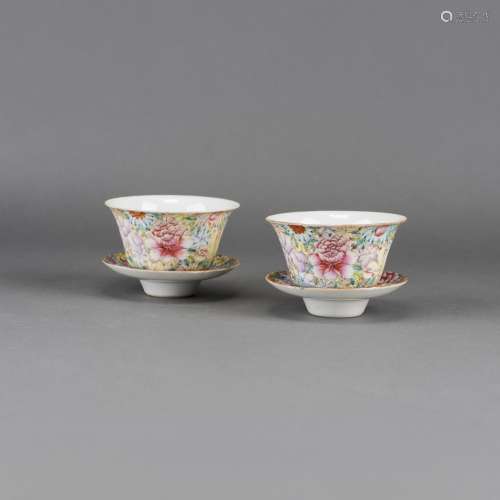 A PAIR OF FAMILLE  ROSE 'MILLEFLEURS' BOWLS AND BASES