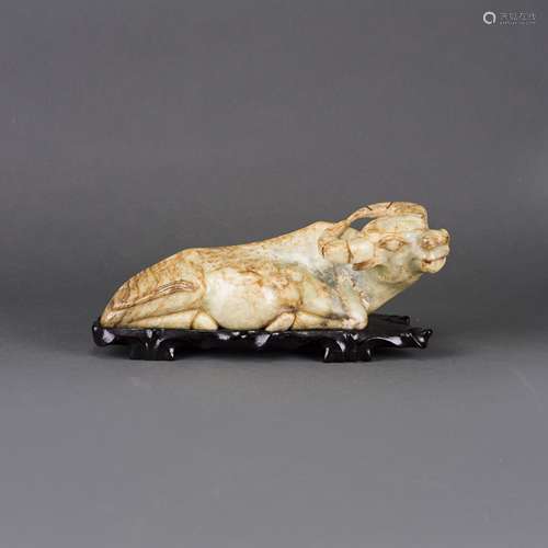 A JADE BUFFALO WITH BASE