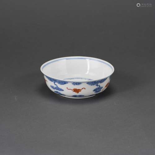 A BLUE AND WHITE AND IRON RED 'BAT' BOWL