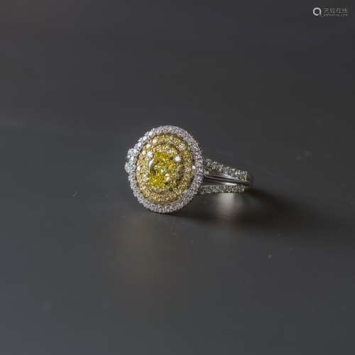 A FANCY COLOR DIAMOND RING, AIGL CERTIFIED