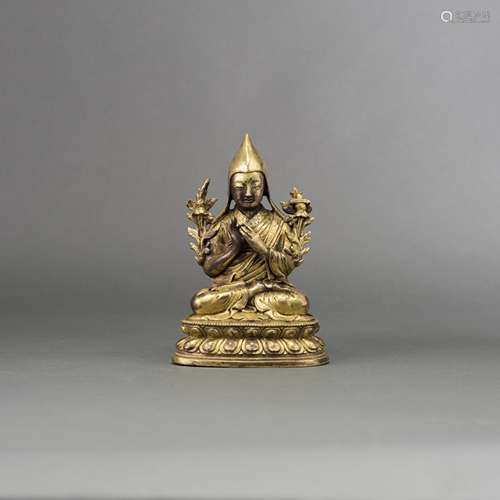 A GILT-BRONZE FIGURE OF BUDDHA, TSONGKHAPA