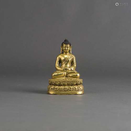 A GILT-BRONZE FIGURE OF BUDDHA