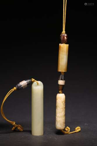 A GROUP OF TWO JADE CARVED 'LEZI' PENDANTS