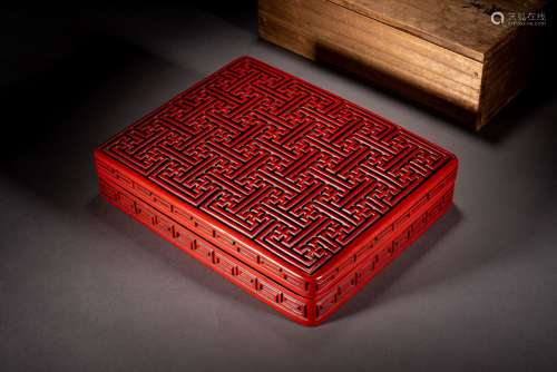 A CINNABAR LACQUER 'WAN' BOX AND COVER