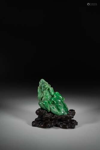 A CHINESE JADEITE 'CABBAGE AND MANTIS' CARVING WITH STAND