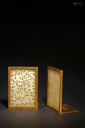 A PAIR OF WHITE JADE RETICULATED GILT BRONZE BOOKENDS
