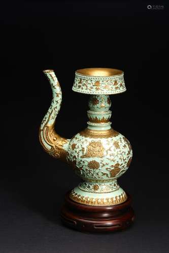 A TURQUOISE GREEN GLAZED GILT DECORATED TIBETAN STYLE EWER