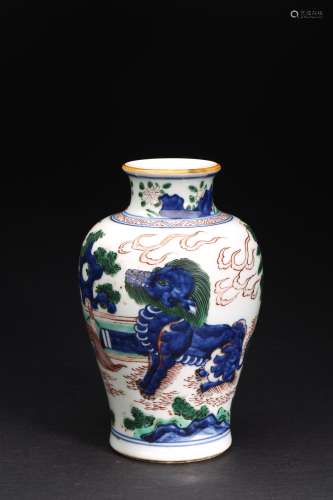 A BLUE AND WHITE WUCAI 'BUDDHIST LION' VASE