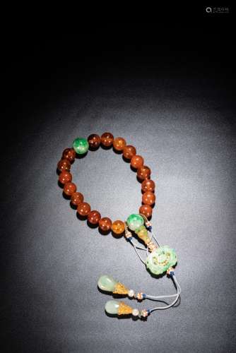 A CHINESE AMBER AND JADEITE ROSARY BRACELET