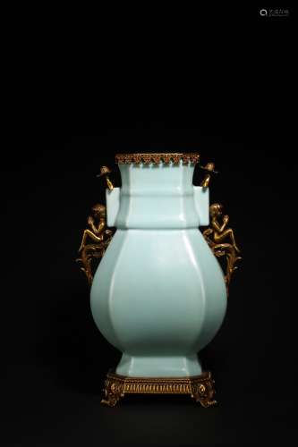 A LARGE GILT BRONZE MOUNTED CHINESE CELADON GLAZED VASE