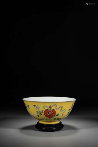 A CHINESE YELLOW GROUND FAMILLE ROSE 'BUDDHIST MOTIF' BOWL