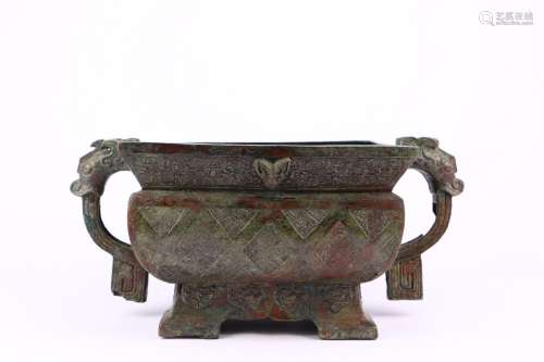 AN ARCHAIC BRONZE SQUARE GUI VESSEL