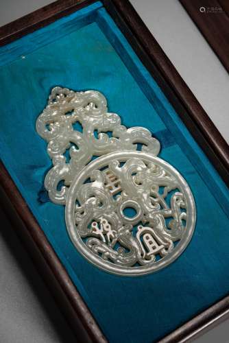 A CHINESE WHITE JADE 'AUSPICIOUS CHARACTERS' PENDANT