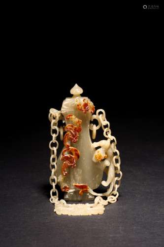 A CARVED JADE HANGING VASE