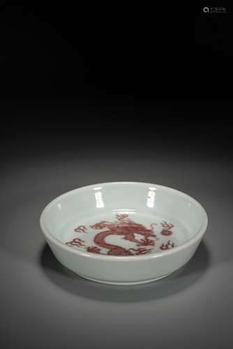 AN UNDERGLAZE RED 'DRAGON' WASHER