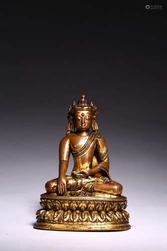 A PARCEL GILT COPPER ALLOY FIGURE OF BODHISATTVA