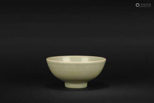 A MOULDED LONGQUAN CELADON BOWL