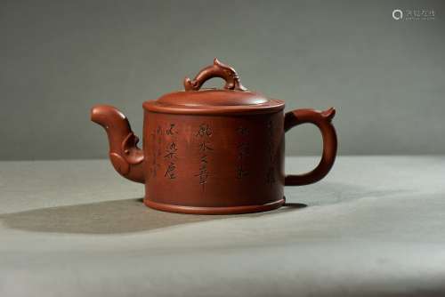 A YIXING INSCRIBED TEAPOT