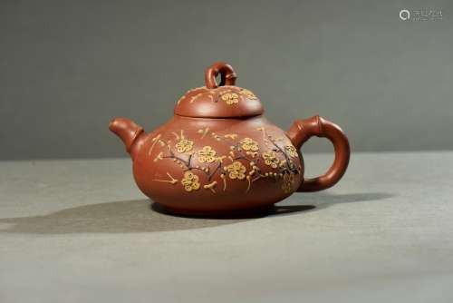 A YIXING 'PRUNUS BLOSSOM' TEAPOT