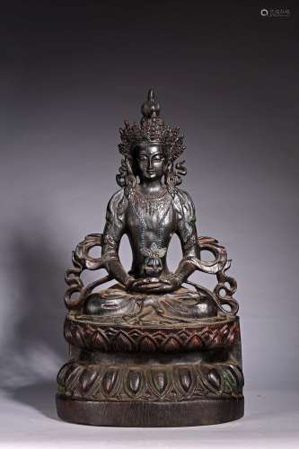 A HARDWOOD CARVED FIGURE OF BODHISATTVA