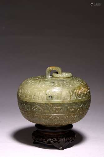 A CHINESE GREEN JADE CARVED BOX AND COVER
