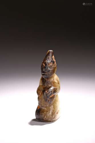 A JADE CARVED KNEELING FIGURE