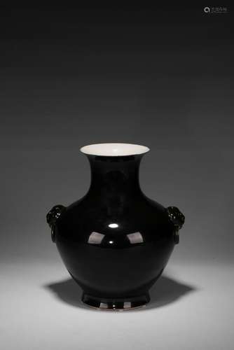 A MIRROR BLACK GLAZED VASE