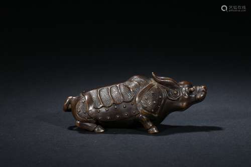 A CLAY FIGURE OF BUFFALO