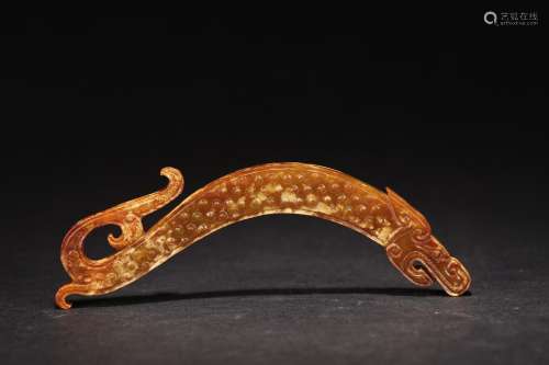 AN ARCHAIC BEIGE AND YELLOW JADE 'DRAGON' PENDANT