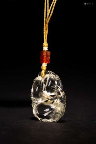 A CHINESE CRYSTAL CARVED 'PEACH AND BIRD' TOGGLE