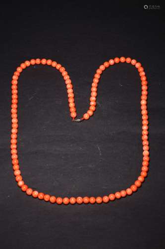 A CORAL BEAD NECKLACE