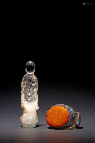 AN AMBER INSET SILVER BRACELET AND A CRYSTAL MONK FIGURE