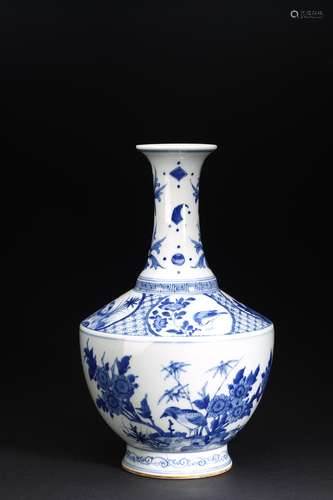 A BLUE AND WHITE FLOWERS AND BIRDS VASE