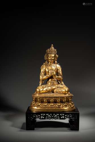 A GILT BRONZE FIGURE OF MANJUSHRI