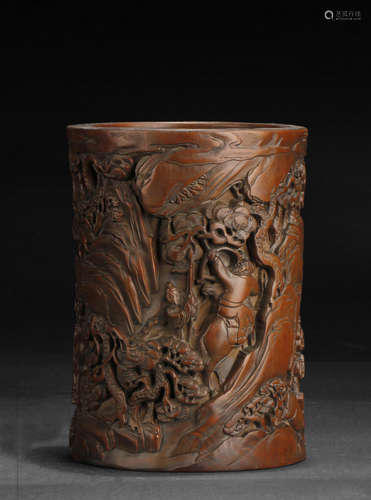 A CARVED HARDWOOD BRUSH POT