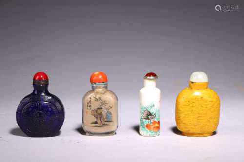 A GROUP OF FOUR SNUFF BOTTLES