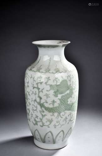 A GREEN GLAZED WHITE GROUND VASE