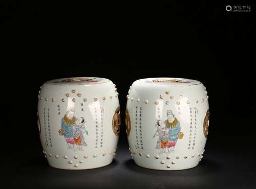 A PAIR OF FAMILLE ROSE 'FIGURES‘ DRUM STOOLS