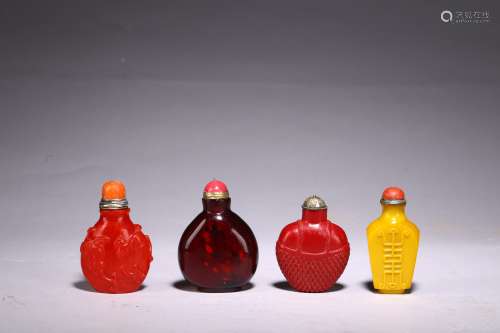 A GROUP OF FOUR PEKING GLASS SNUFF BOTTLES