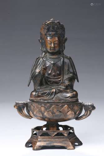 A BRONZE PARCEL GILT FIGURE OF GUANYIN