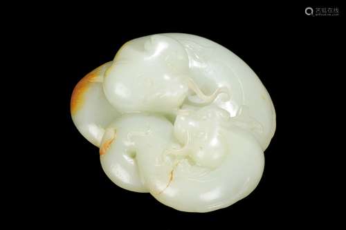 A WHITE JADE CARVED ‘SILVER CARPS' FIGURAL GROUP