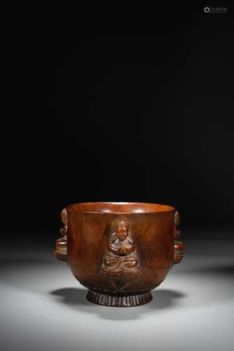 A SANDALWOOD CARVED 'BUDDHIST' ALMS BOWL