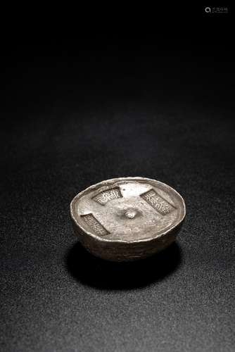 A CHINESE SILVER INGOT WITH MARKS