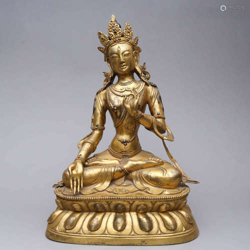 A GILT-BRONZE TARA STATUE