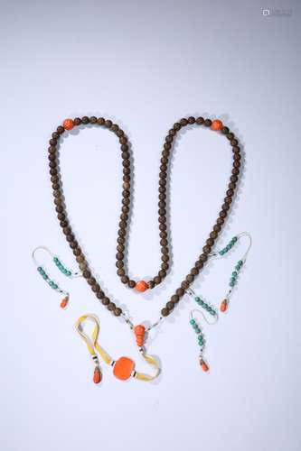 A CHINESE AGARWOOD CARVED COURT NECKLACE