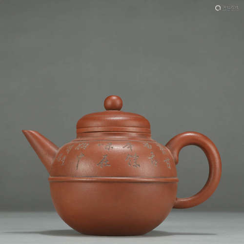 AN INSCRIBED ZISHA TEAPOT